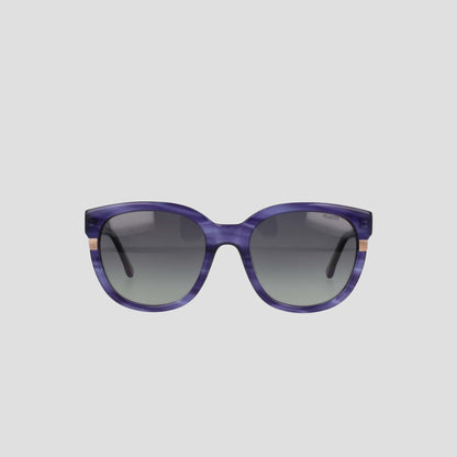 The Champion Women's Polarized Curvaceous Square sunglasses are shown from the front against a plain light gray background. These oversized purple sunglasses feature gradient dark lenses, a glossy acetate frame with subtle gold accents on the sides near the hinges, and an RX-able design for customized prescription lenses.