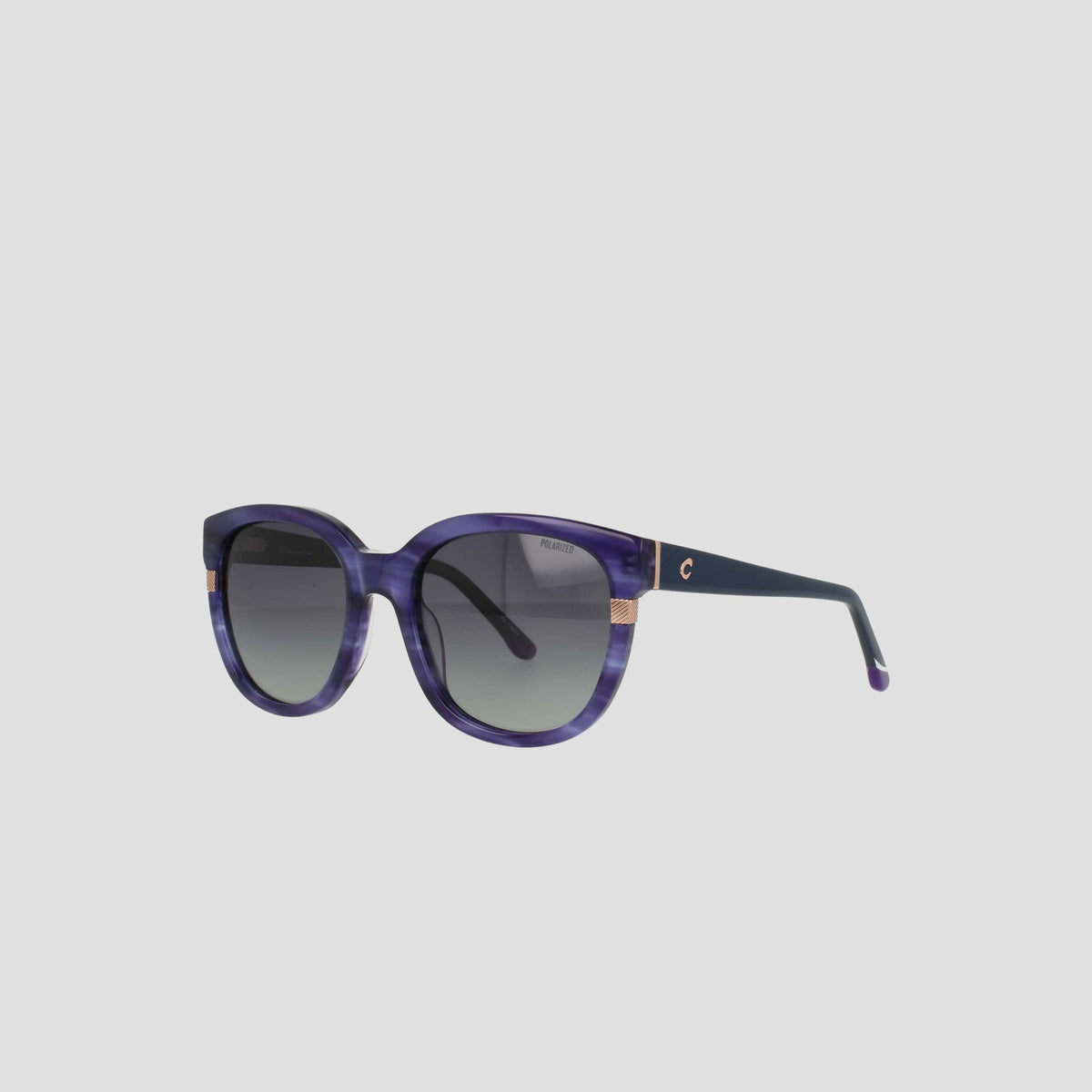 Women's Polarized Curvaceous Square sunglasses by Champion, featuring a purple acetate frame with gold accents on the temples and dark gradient lenses, displayed against a plain light background.