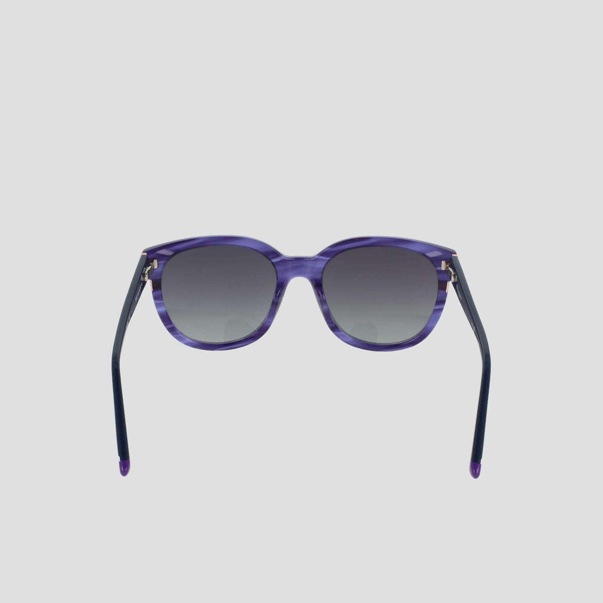 Women's Polarized Curvaceous Square sunglasses by Champion, featuring a bold square silhouette with gradient dark lenses, are showcased from the front against a plain light gray background. The acetate frame offers a modern touch, while the temples are black and gently curved at the ends.