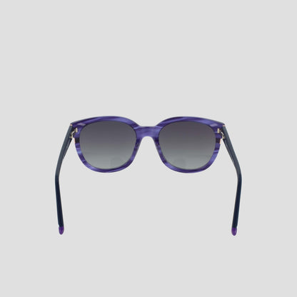 Women's Polarized Curvaceous Square sunglasses by Champion, featuring a bold square silhouette with gradient dark lenses, are showcased from the front against a plain light gray background. The acetate frame offers a modern touch, while the temples are black and gently curved at the ends.