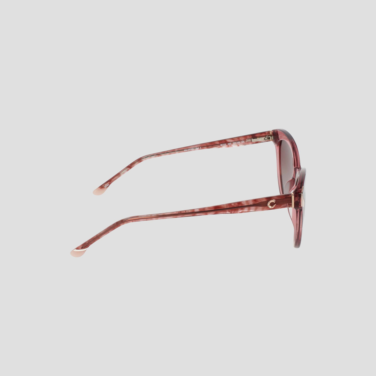 Side view of the Champion Women's Polarized Cateye sunglasses, featuring pink marbled cat-eye frames with round lenses and light pink temple tips, displayed on a plain light background.
