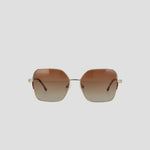 Champion Women's Polarized Boho Square sunglasses, featuring a gold frame and bold square silhouette with large polarized gradient lenses that transition from brown at the top to a lighter shade at the bottom, displayed against a plain white background.