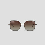 The Champion Women’s Polarized Boho Square sunglasses feature a thin black metal frame and brown gradient polarized lenses, displayed against a plain light gray background.