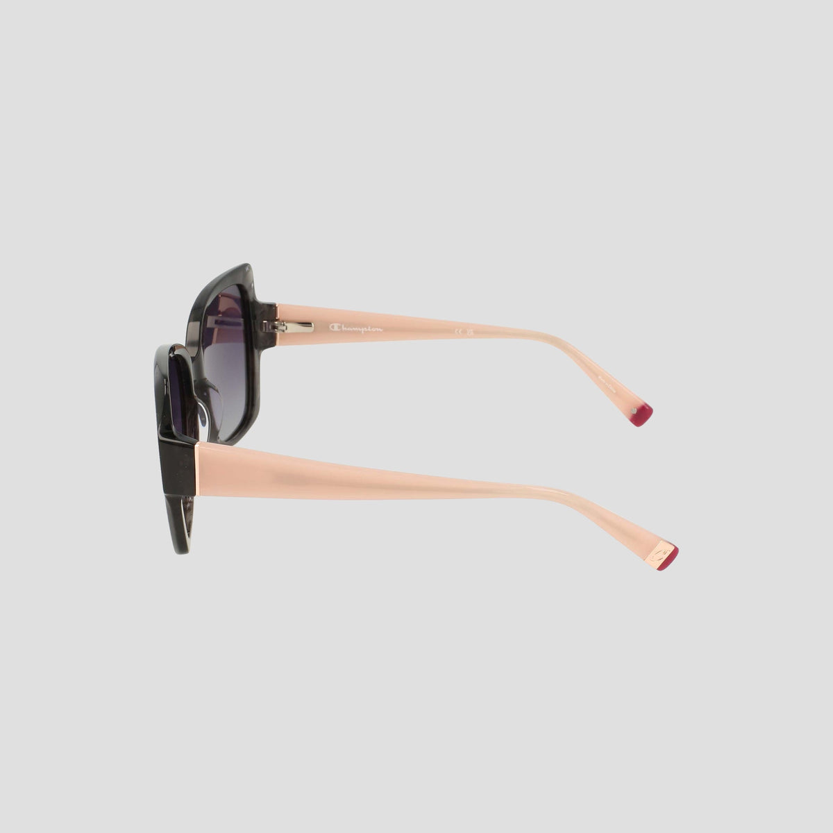 Side view of Champion Women's Polarized Oversized Butterfly sunglasses, handmade from black and pink acetate with dark polarized lenses, featuring pink arms and red tips. Set against a plain light gray background, this minimalist eyewear stands out in style.