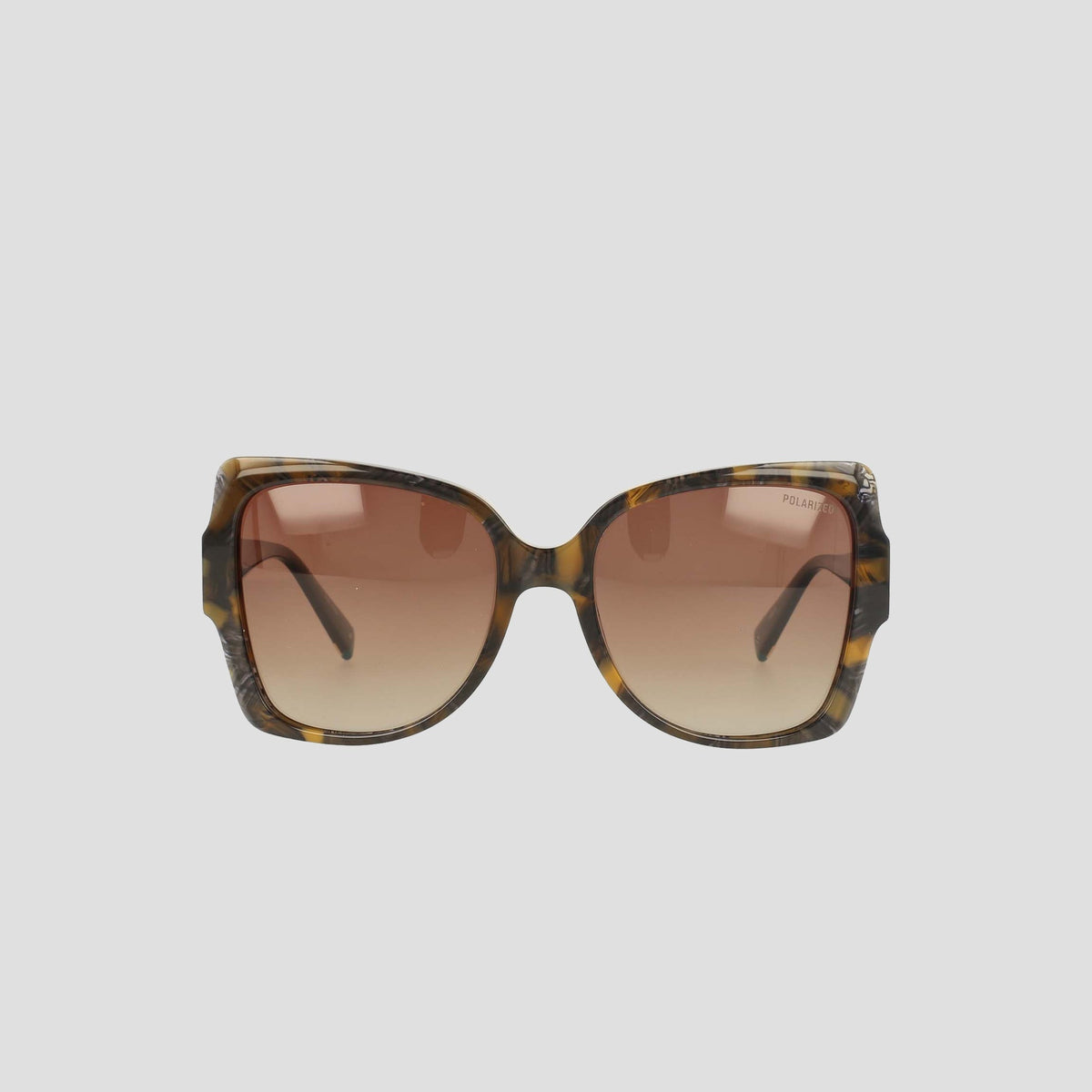 Champion Women's Polarized Oversized Butterfly sunglasses, crafted from handmade acetate in a brown tortoiseshell finish with gradient brown lenses, are shown facing forward against a plain light background—a true example of minimalist eyewear.
