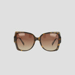 Champion Women's Polarized Oversized Butterfly sunglasses, crafted from handmade acetate in a brown tortoiseshell finish with gradient brown lenses, are shown facing forward against a plain light background—a true example of minimalist eyewear.