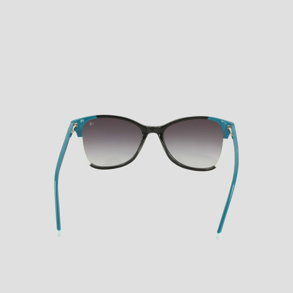 A pair of Champion Women's Polarized Catty Square sunglasses with black frames, gradient dark lenses, and teal-colored arms, featuring polarized lenses for enhanced clarity, displayed on a plain light background.