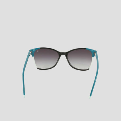 A pair of Champion Women's Polarized Catty Square sunglasses with black frames, gradient dark lenses, and teal-colored arms, featuring polarized lenses for enhanced clarity, displayed on a plain light background.