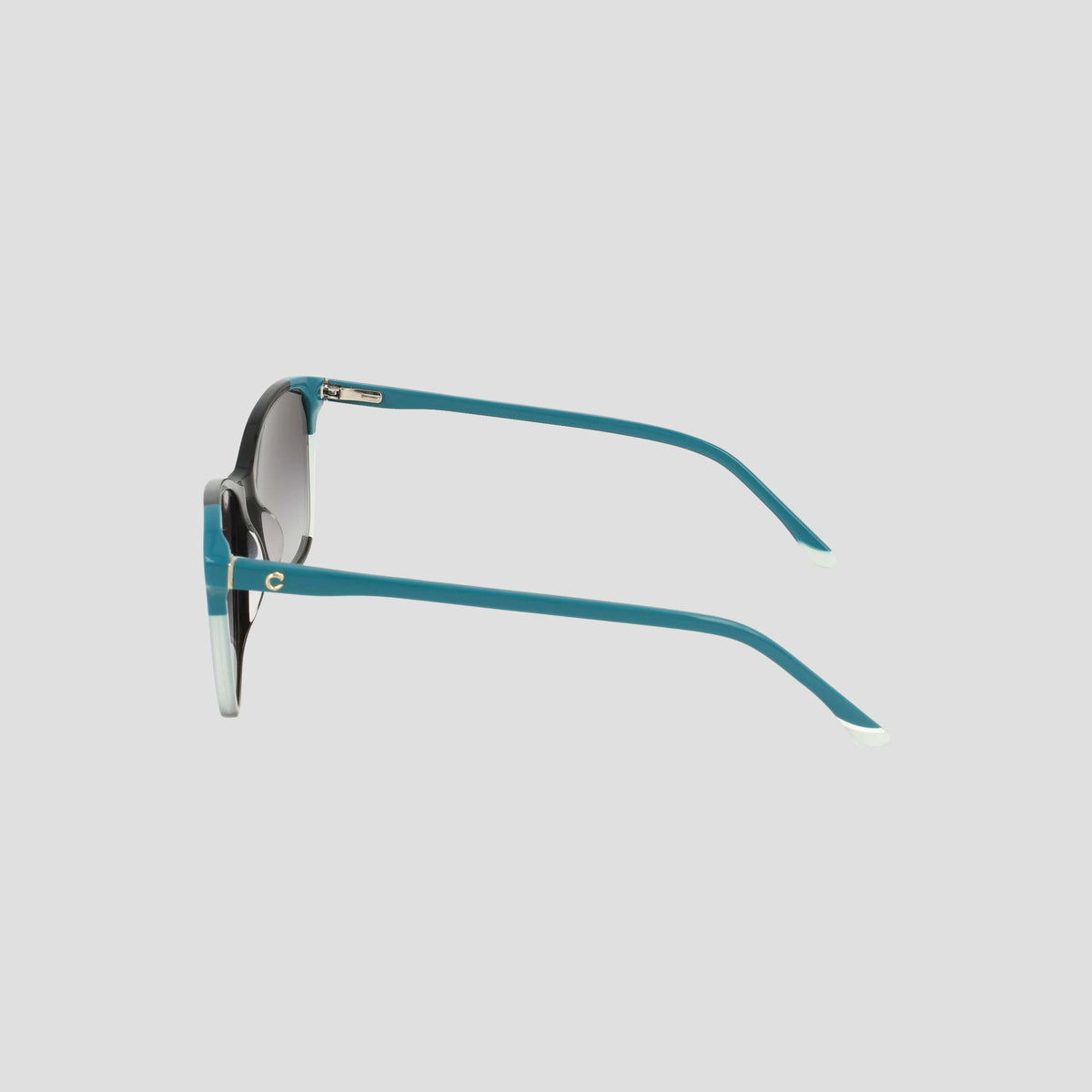 Side view of teal-framed Champion Women's Polarized Catty Square sunglasses featuring dark polarized lenses and white-tipped arms, crafted from handmade acetate, displayed against a plain light gray background.