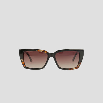 The Champion Women's Polarized Slim Rectangle sunglasses feature handmade dark tortoiseshell acetate frames and gradient brown lenses, shown against a plain light gray background.