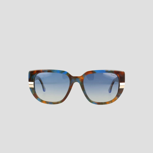 Front view of the Champion Women's Polarized Modified Cateye sunglasses featuring oversized square handmade acetate frames in a multicolored tortoiseshell pattern, gradient blue polarized lenses, and two white stripes on each temple, set against a plain light background.