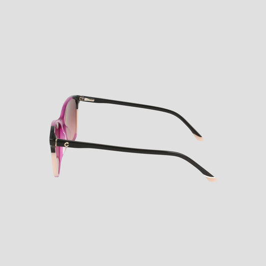 Side view of the Champion Women's Polarized Catty Square sunglasses featuring black arms, pink-tinted polarized lenses, and beige tips, set against a plain light gray background. The classic cat-eye silhouette showcases timeless style and versatile appeal.