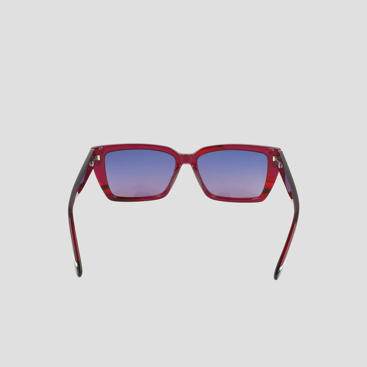 The Champion Women's Polarized Slim Rectangle sunglasses feature a red handmade acetate frame and gradient blue-purple lenses, shown from the front against a plain light background.