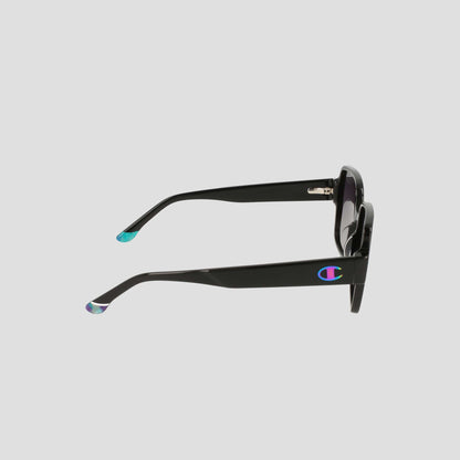 Side view of Champion Women's Polarized Glam Square sunglasses with black oversized frames, handmade acetate construction, blue and purple accents on the temple tips, and the Champion logo in blue and red on the left arm.