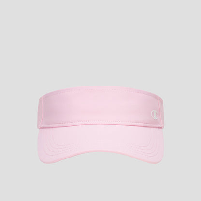 A Champion Adjustable Visor in light pink features a curved brim and a small white “C” logo on the front right, offering sun protection and an adjustable fit. The product is displayed against a plain gray background.