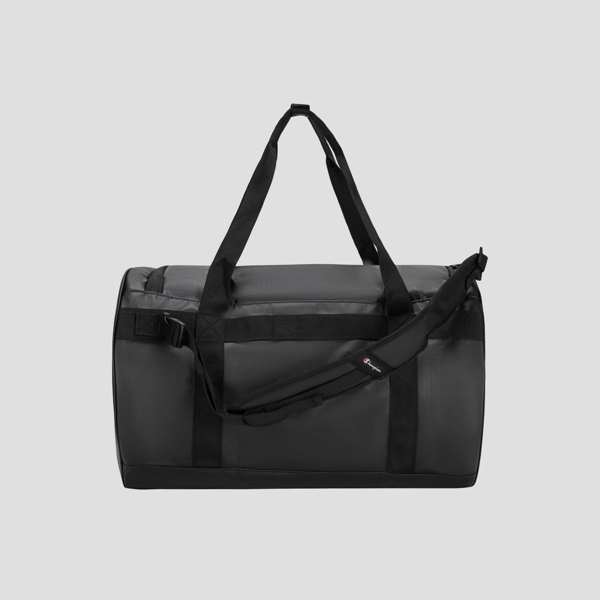 Champion Approach Convertible Duffel in black, featuring two carry handles, an adjustable shoulder strap, and a zippered main compartment, shown against a plain gray background.