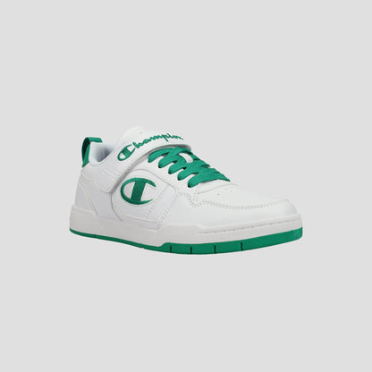 The Kids' Arena Power Low by Champion is a white kids' sneaker with green laces, sole, and accents. A large C logo decorates the side and "Champion" in green script appears on the tongue, showcasing classic Champion style.