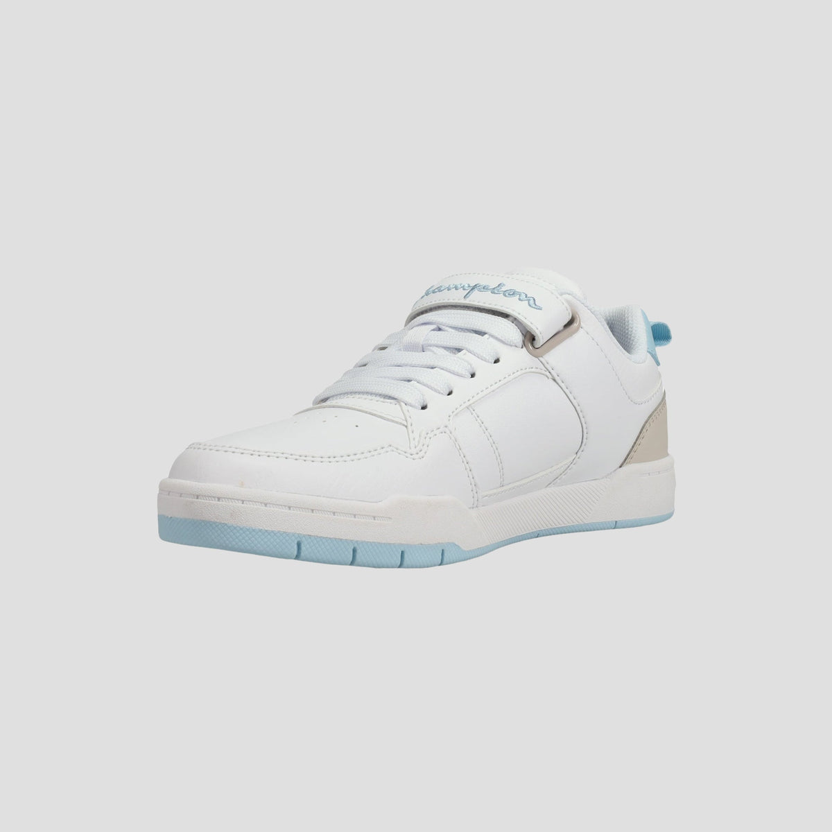The Champion Kids' Arena Power Low sneakers feature a white design with light blue accents, a light blue sole, white laces, and a beige heel detail—standing out beautifully against any simple background.