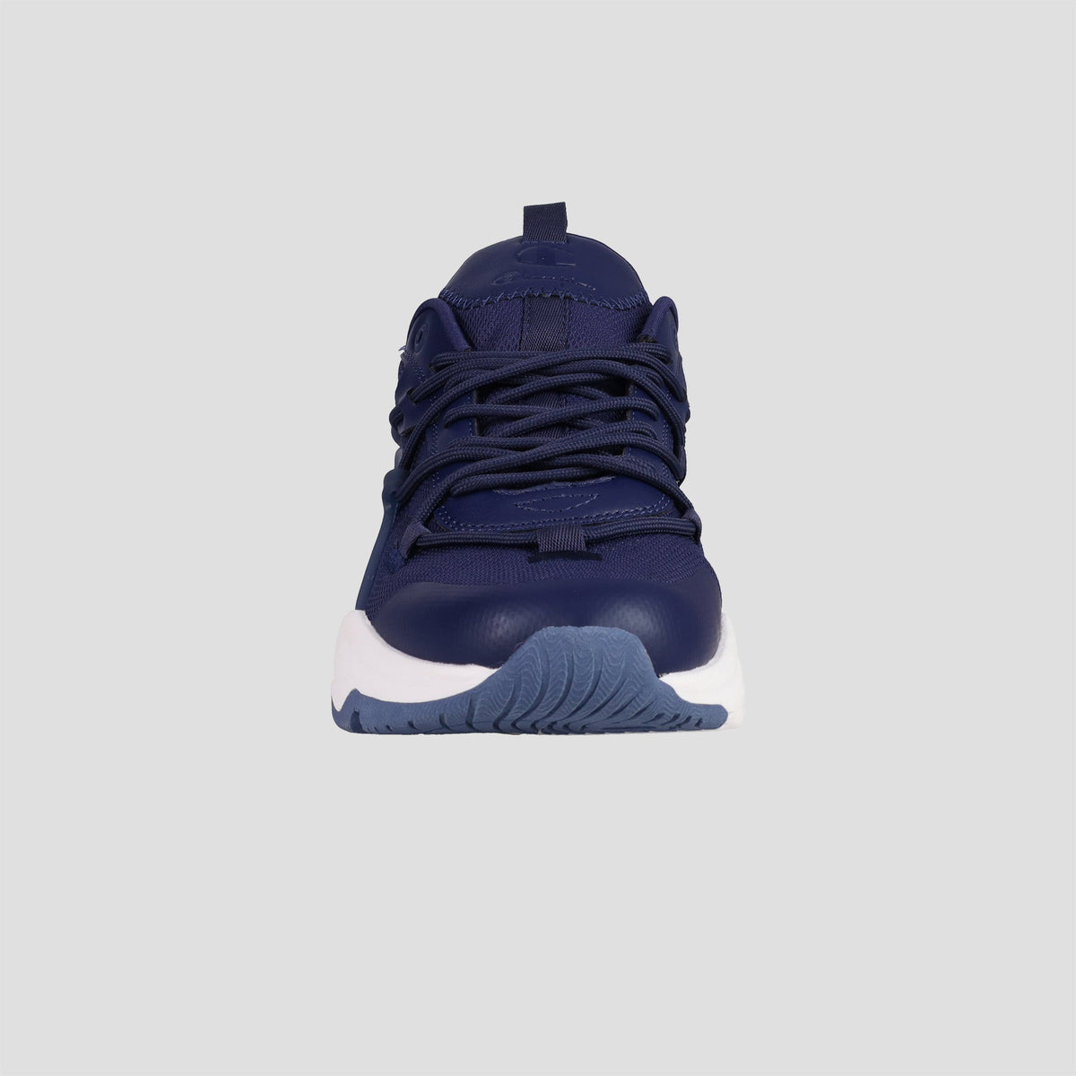 The Champion Men's Hyper C Pilot sneaker is displayed from the front against a light gray background, showcasing its navy blue mesh upper, matching laces, textured sole, and white midsole.