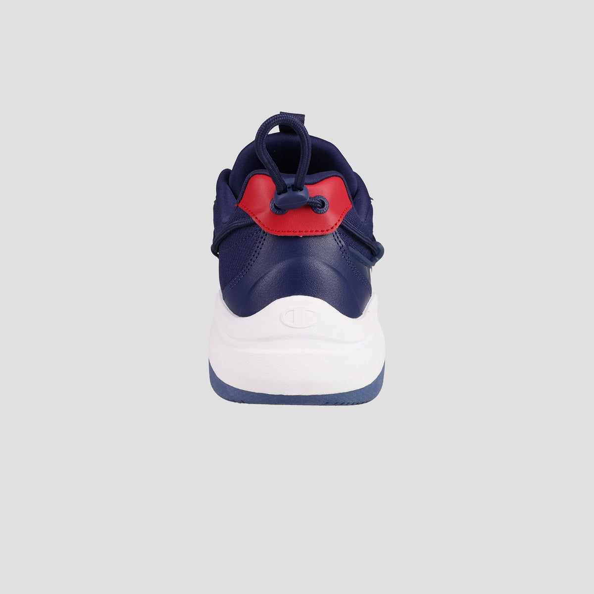 The Champion Men's Hyper C Pilot, a navy blue lifestyle sneaker with a durable mesh upper, white sole, and red accent, is displayed from the back against a plain light gray background.