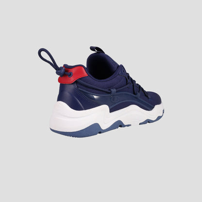 The Champion Men's Hyper C Pilot sneaker features a navy blue mesh upper, chunky white sole, red heel accent, and back pull tab. Displayed against a plain light gray background.