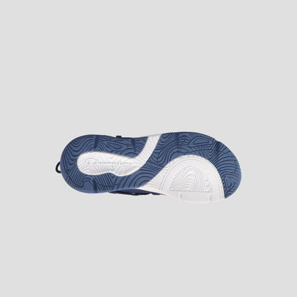 The image displays the sole of the Champion Men's Hyper C Pilot sneaker, featuring a blue and white wavy pattern, varied textures, and "Champion" engraved near the heel against a light gray background.