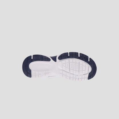 The image shows the bottom view of the Champion Men's Ch Twr 1 trainer sole, featuring a white cushioned EVA midsection and black textured tread at the toe and heel for grip and flexibility, set against a plain light background.