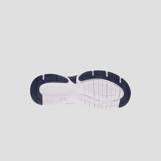 The image shows the bottom view of the Champion Men's Ch Twr 1 trainer sole, featuring a white cushioned EVA midsection and black textured tread at the toe and heel for grip and flexibility, set against a plain light background.