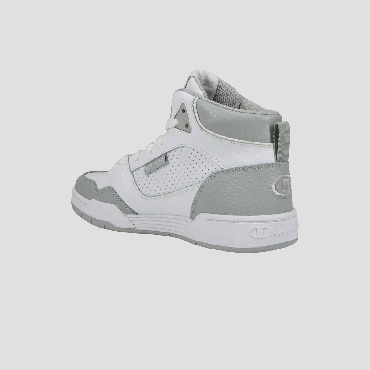 The Champion Men's 5-on-5 High is a white and gray high-top sneaker featuring perforated detailing, cushioned collar, gray accents on the toe, heel, and ankle, and a white sole. The shoe is shown angled to display its outer side and back.