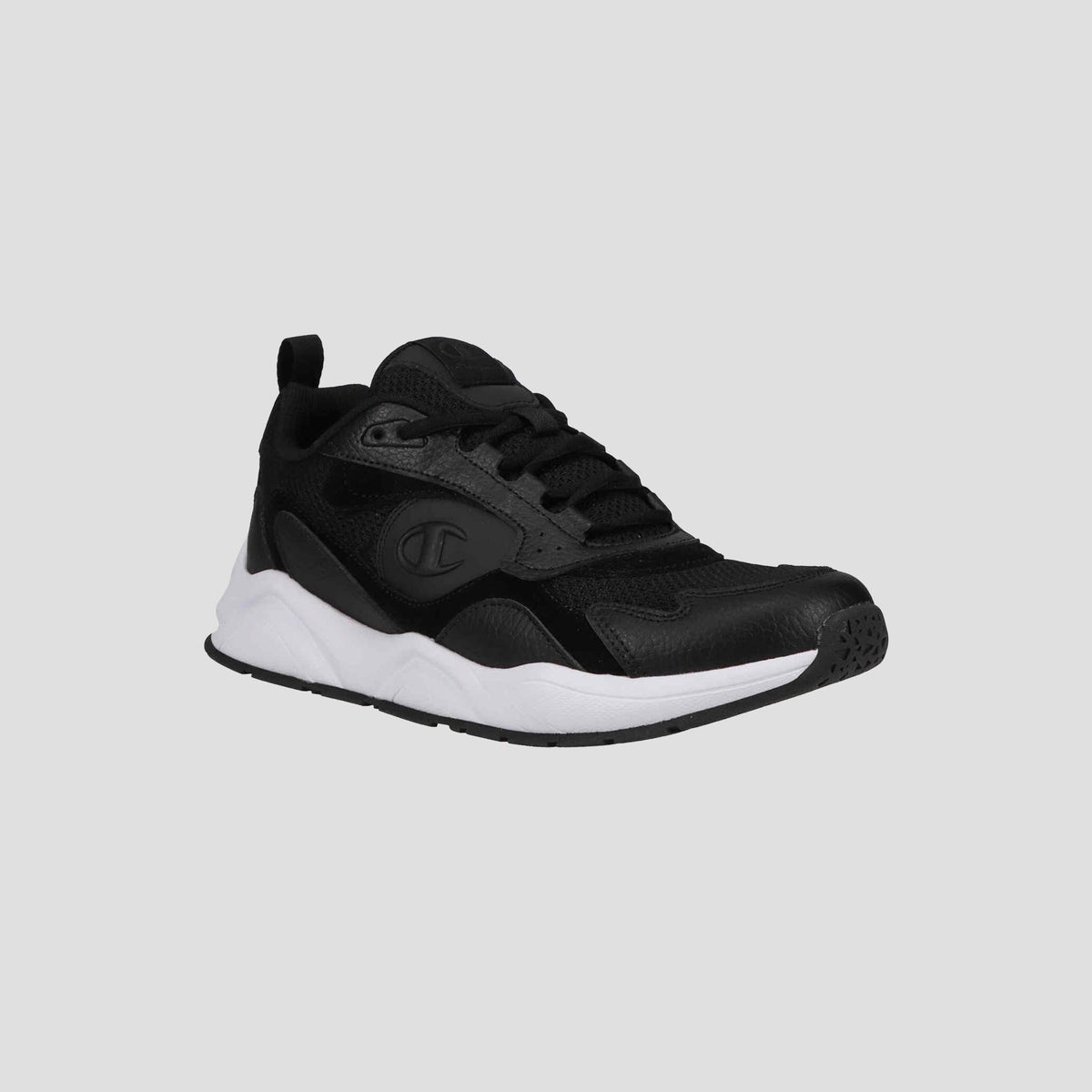 The Champion Men's 9318 Vale is a black all-purpose sneaker with a leather and mesh upper, black laces, and a white cushioned sole, displayed on a plain light gray background.