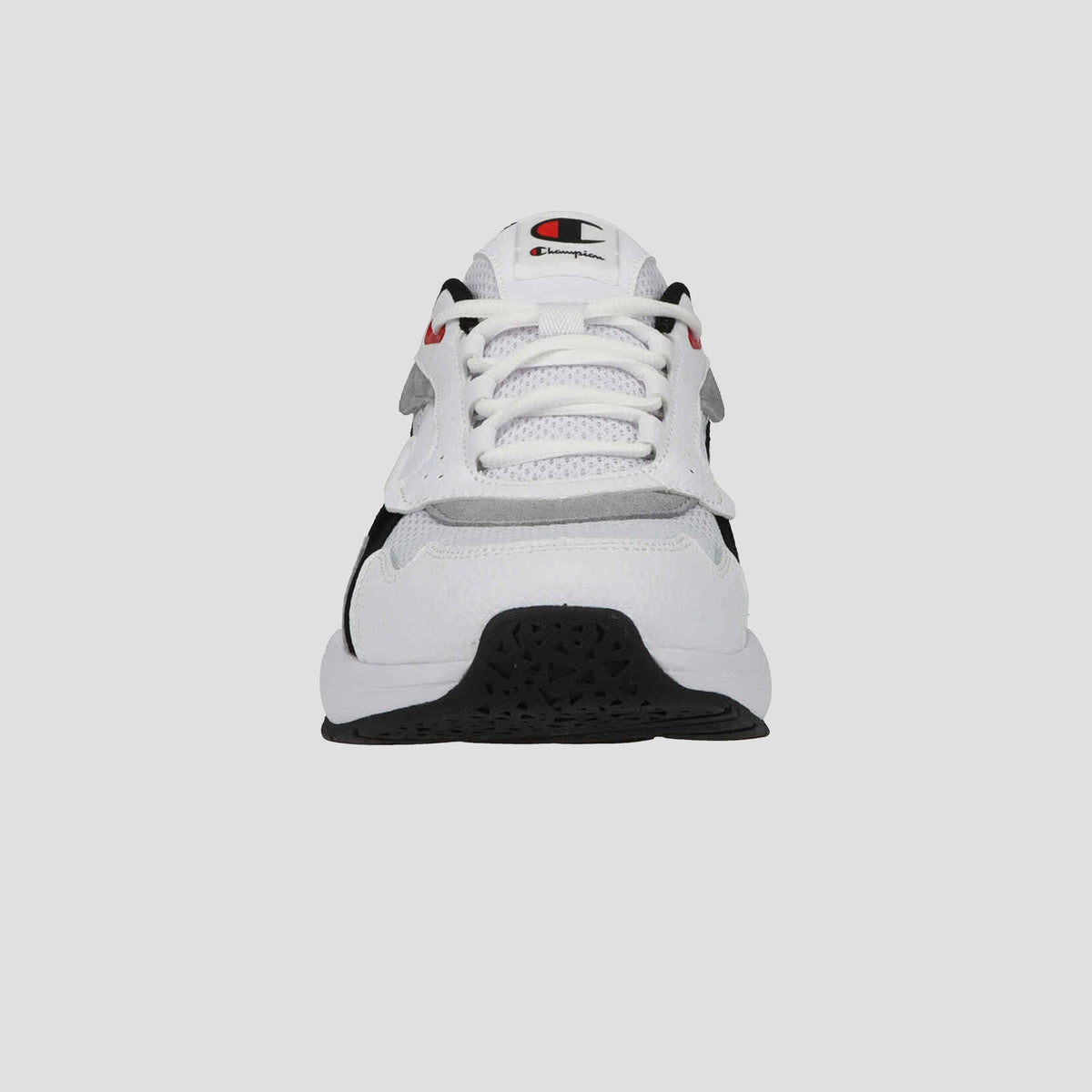 Front view of the Champion Men's 9318 Vale sneaker in white with black, gray, and red accents. Features a lace-up design, cushioned collar, Champion logo on tongue, and durable rubber sole against a plain light gray background.