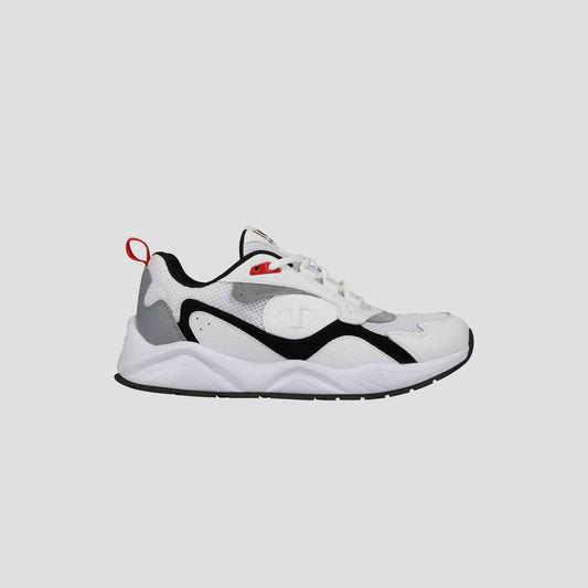 The Champion Men's 9318 Vale is a white athletic sneaker with black and gray accents, a cushioned collar, durable rubber sole, and red heel pull tab, displayed in side profile against a plain light gray background.