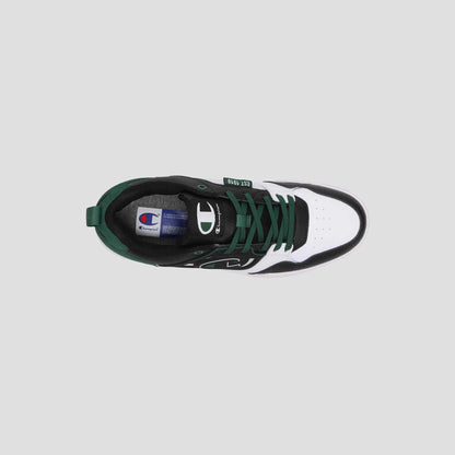 Top view of the Champion Men's 5-on-5 Low sneaker in black, white, and dark green with laces, cushioned collar, and Champion logo on the side and tongue, set against a plain light grey background for a minimalist look.