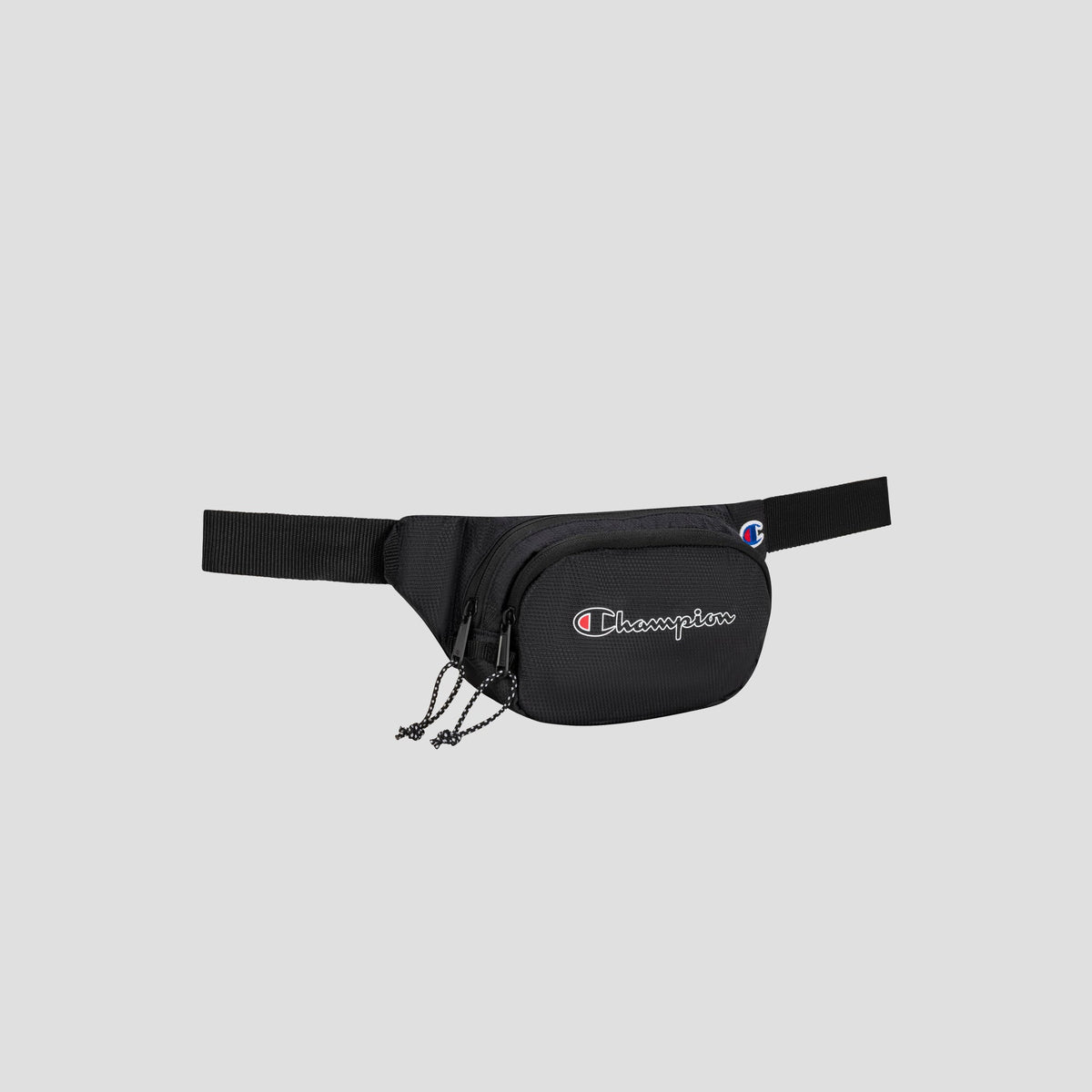 Center Waist Pack by Champion in black, featuring zippered compartments, a front logo detail, and an adjustable strap, shown against a plain light gray background.