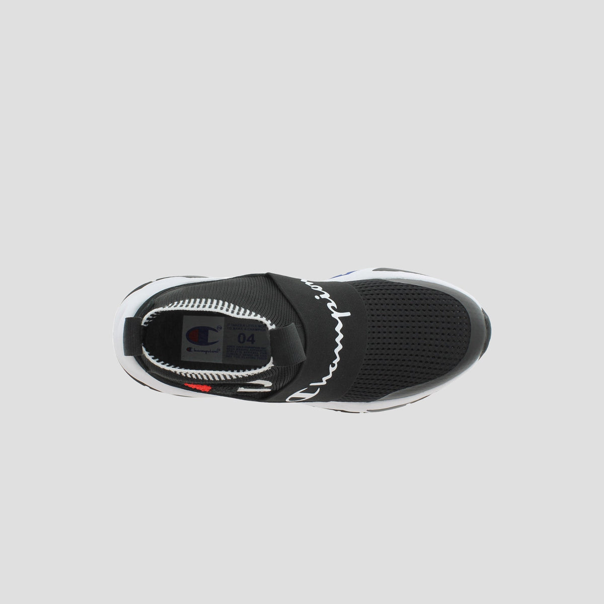 Top view of the Champion Kids' Rally Pro, a black knit sneaker with a wide elastic midfoot strap, white sole, mesh upper, and Champion logo on the insole and strap—ideal for fans of sock-style ankle shoes.
