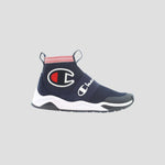 The Men's Rally Pro by Champion is a navy blue slip-on athletic shoe with a cushioned insole, white sole, red and white striped ankle collar, a large “C” logo, and “Champion” text across the midfoot strap.