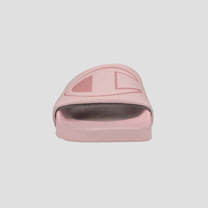 Front view of the Champion Women's IPO Slide in pink, featuring a wide strap with logo design and a contoured footbed, set against a plain light background.
