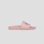 The Champion Women's IPO Slide features a light pink color, contoured footbed, and wide strap with the brand's logo in darker pink, shown in side profile on a plain white background.