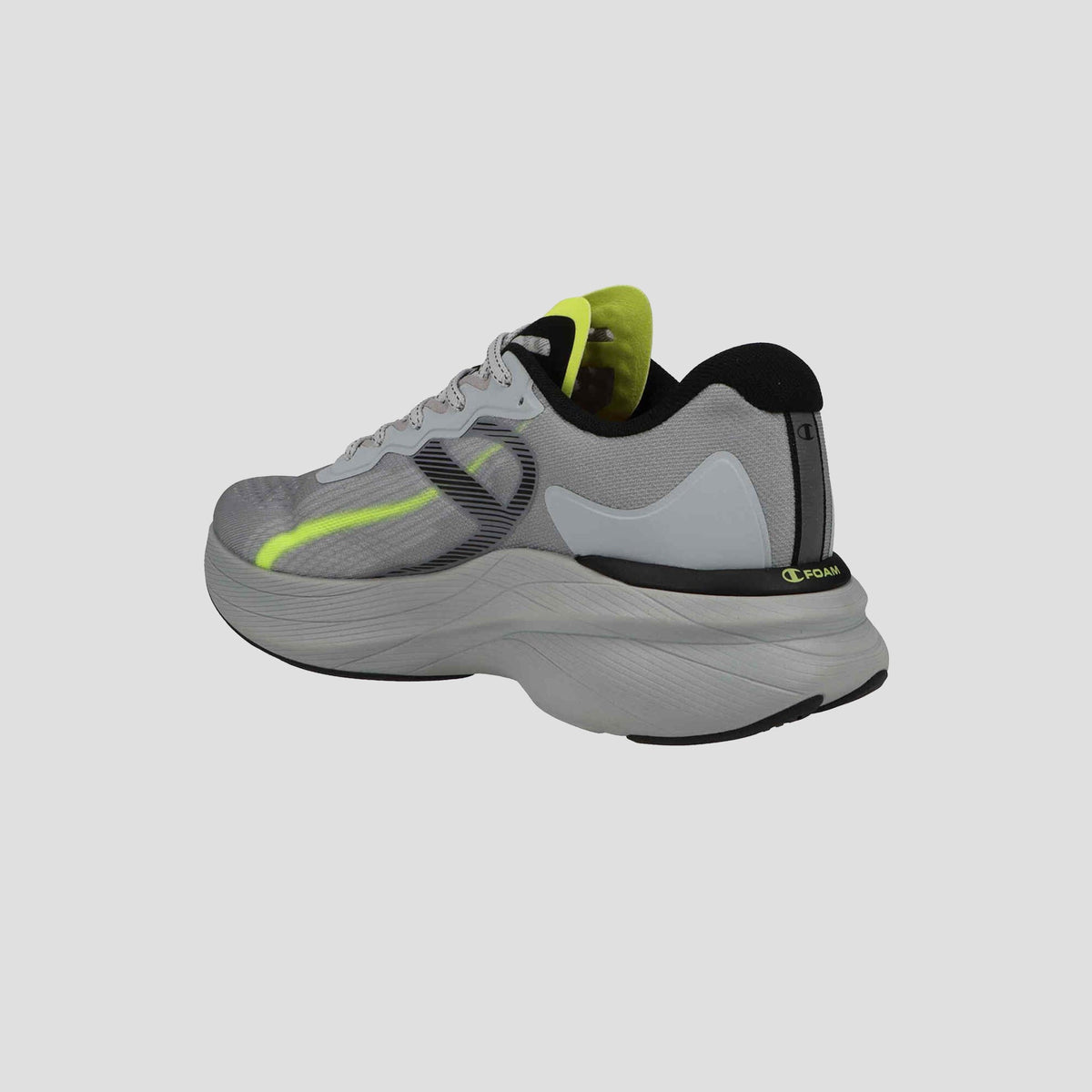 The Champion Men's Acceleron running shoe is shown at an angle on a light gray background, featuring gray uppers, neon yellow accents, black details, and a thick curved white sole.