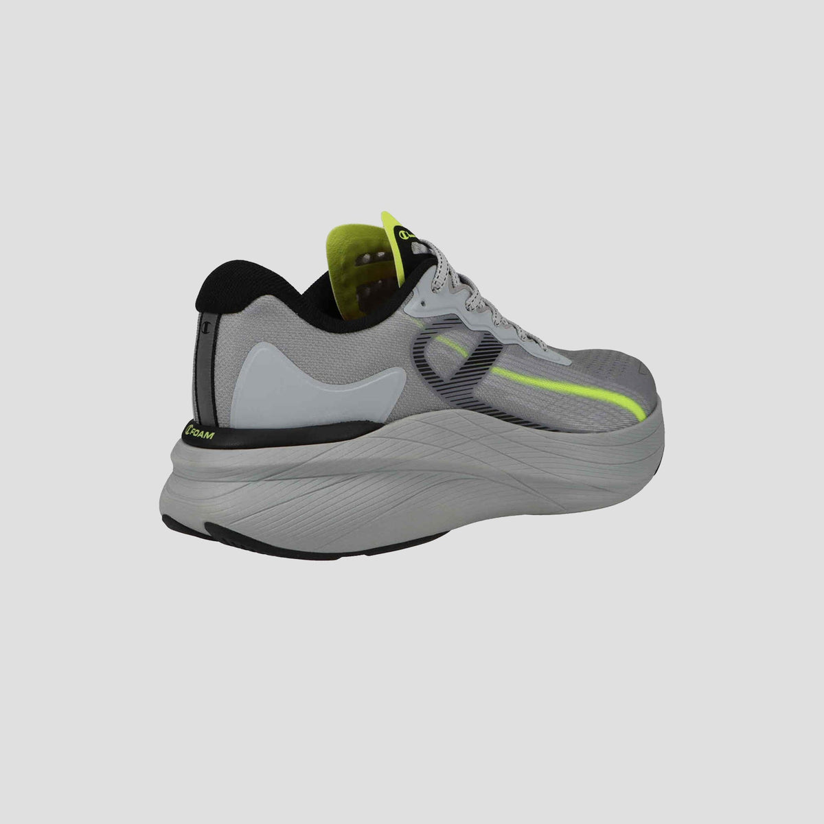 The Men's Acceleron by Champion features gray running shoes with a thick, curved sole, black and neon yellow accents, black heel lining, and side mesh detail, shown from the back against a plain light background.