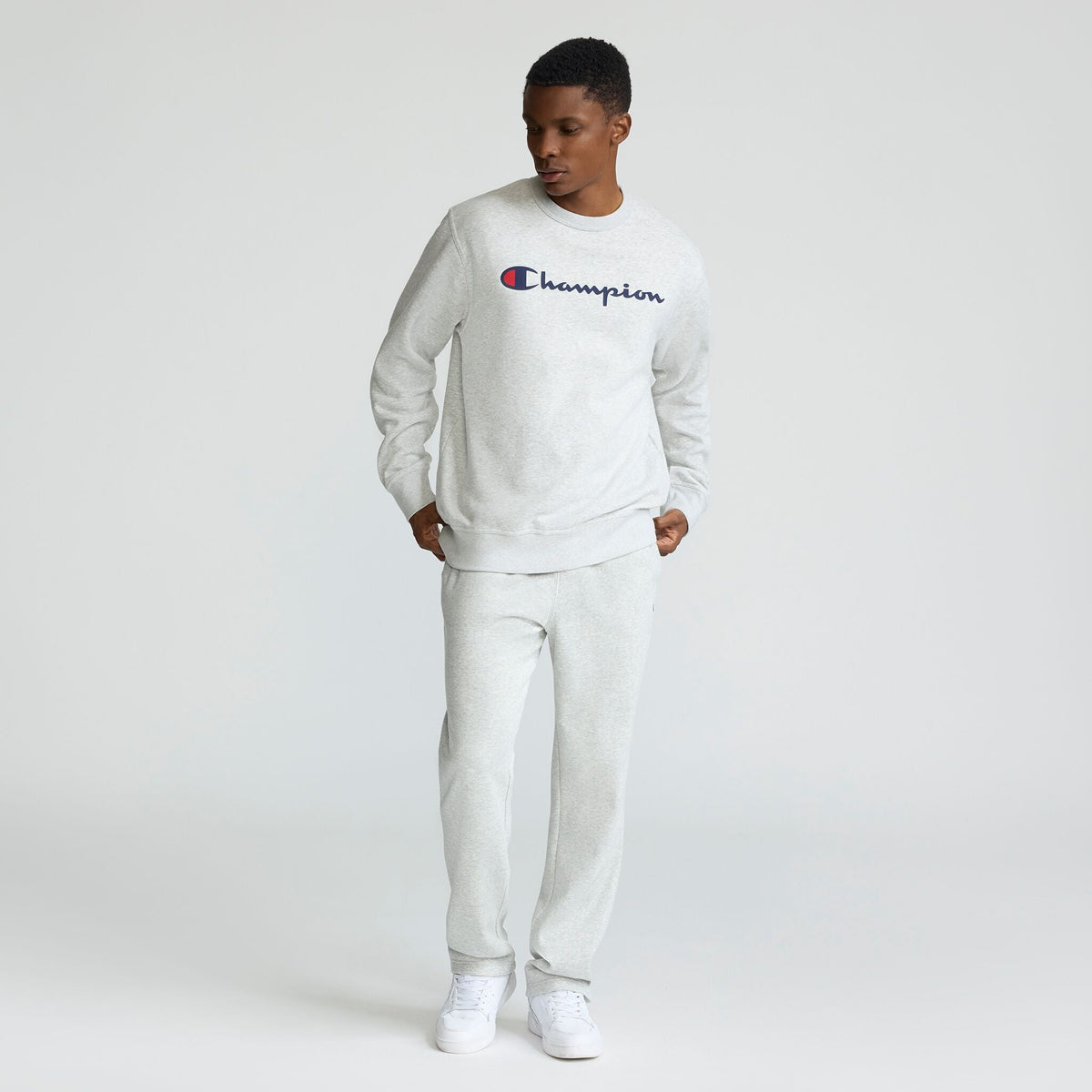 Champion Powerblend Crewneck Sweatshirt, Classic Script Logo in Platinum Silver Heather