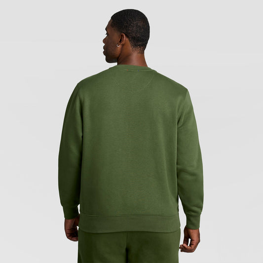 A man seen from behind wearing an olive green Champion Powerblend Crewneck Sweatshirt, C Logo - Big & Tall.