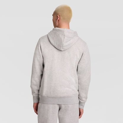 A person with short blond hair is seen from behind, wearing a Champion Powerblend Full-Zip Hoodie with C Logo and matching light gray sweatpants, standing against a plain light background.