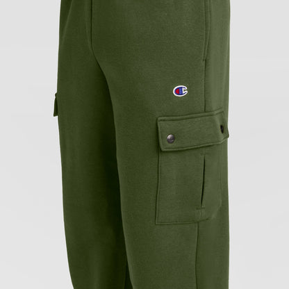 Close-up of Champion Fleece Cargo Pant, C Logo in green streetwear style, featuring a small C logo on the thigh and a buttoned side pocket—blending classic Champion design with modern comfort and style.