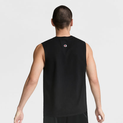 A man with short dark hair, seen from behind, wears the Champion Muscle Tank, C Logo—a sleeveless black tee with a small Champion logo near the neckline—against a plain white background.
