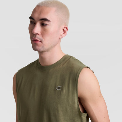 A person with short, bleached blond hair models the Champion Muscle Tank, C Logo—an olive green muscle tee with a small embroidered chest logo—against a plain light gray backdrop.