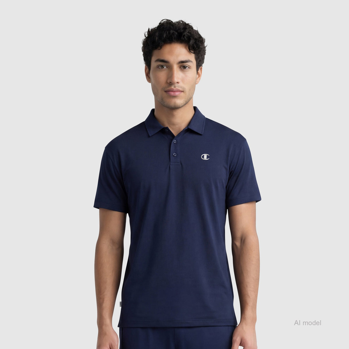 A person stands facing forward, wearing the Champion Sport Polo with short sleeves and a small white "C" logo on the chest, set against a plain light gray background.