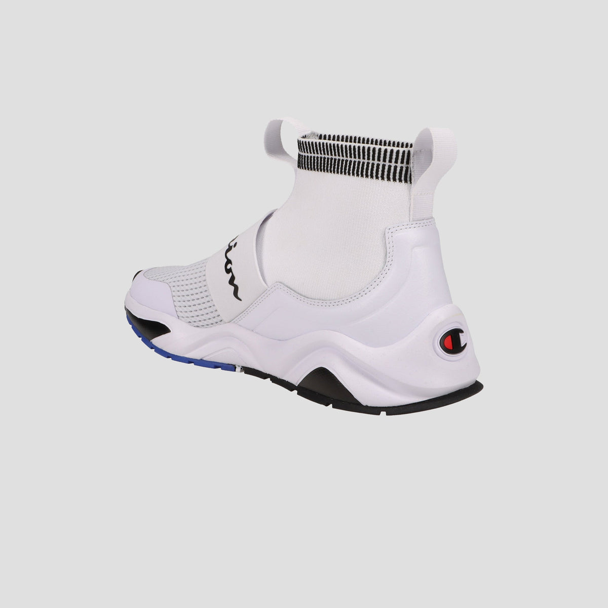 The Champion Men's Rally Pro sneaker in white features a sock-style ankle, high collar, black and blue sole accents, and a Champion logo on the heel, shown from a rear side angle against a plain background.