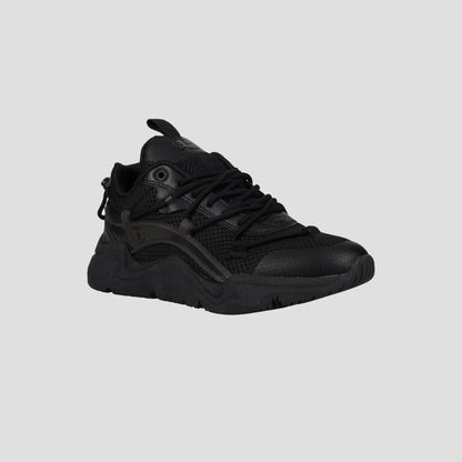The Champion Men's Hyper C Pilot W lifestyle sneaker features a black mesh upper, synthetic overlays, black laces, and a chunky sole, shown on a light gray background.