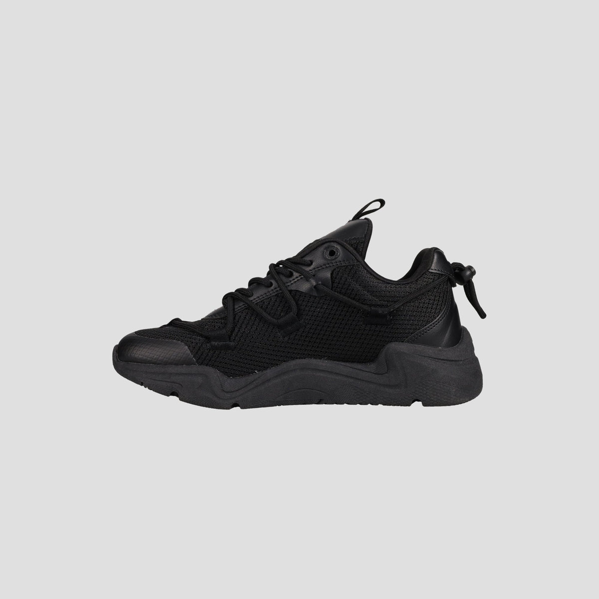 The Champion Men's Hyper C Pilot W is a black lifestyle sneaker featuring a durable mesh upper, leather accents, thick textured sole, lace-up front, and heel pull tab, shown on a plain light gray background.